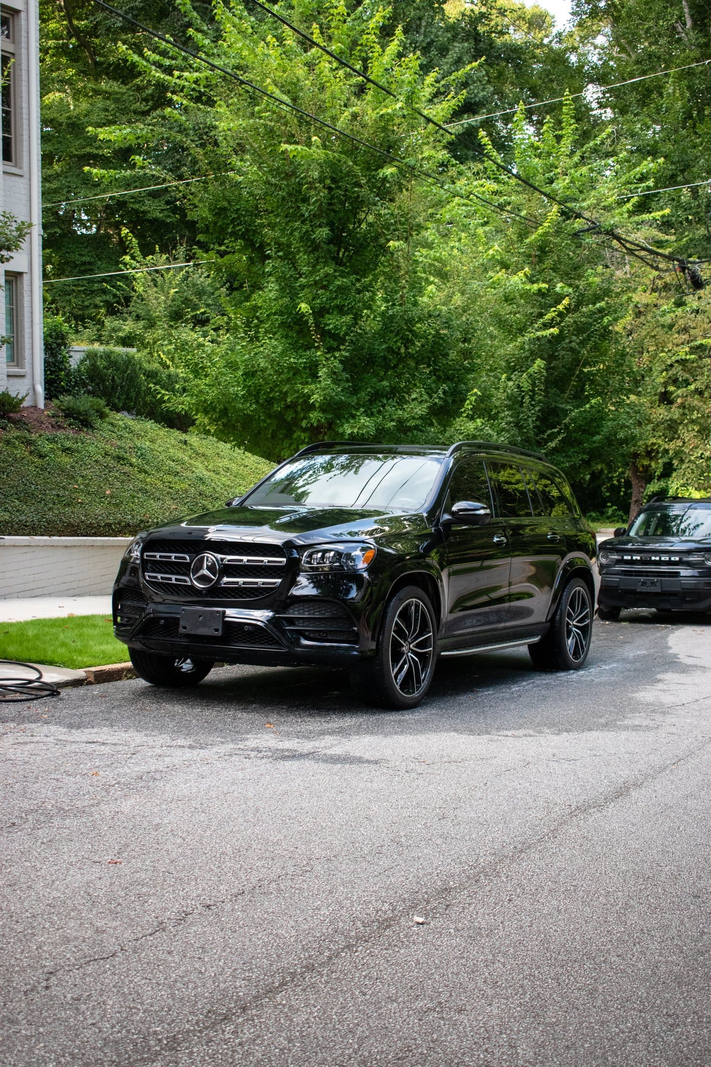 Glossy black vehicle after professional ceramic protection
