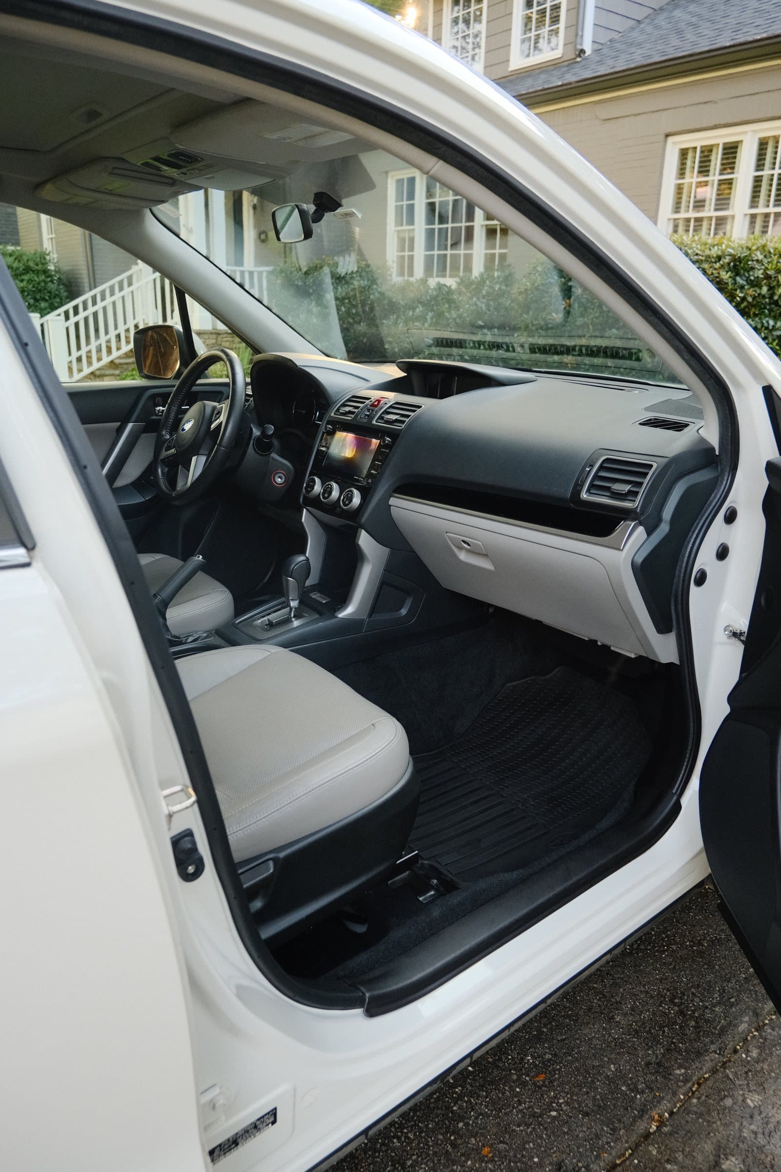 Clean white vehicle interior after detailing
