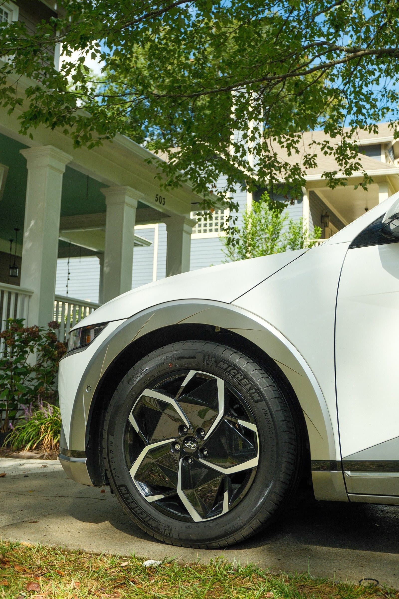 Clean wheel and front quarter of a white Hyundai Ioniq